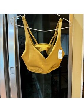 aerie Ribbed V-Neck Sports Bra in gold. No TAG